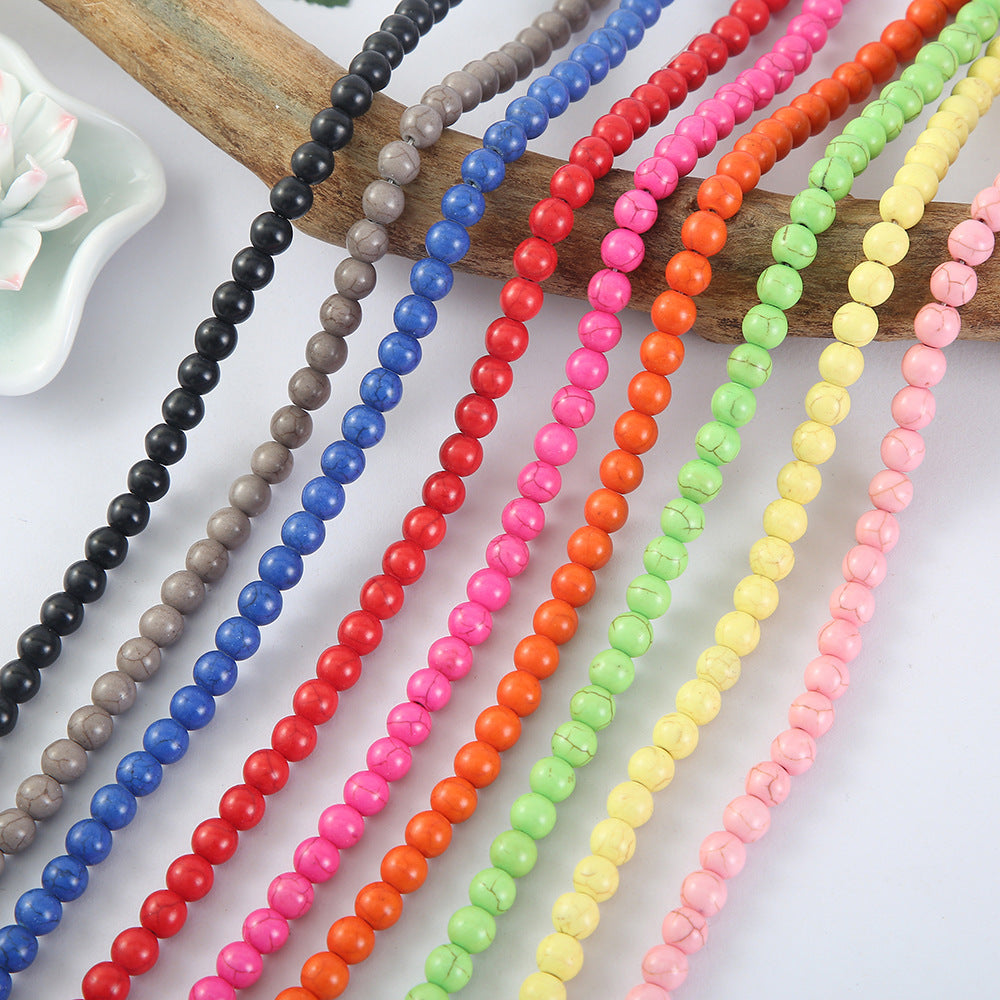 Al por mayor 10Strings/Pack Synthetic Turquesa Diy Round Beads